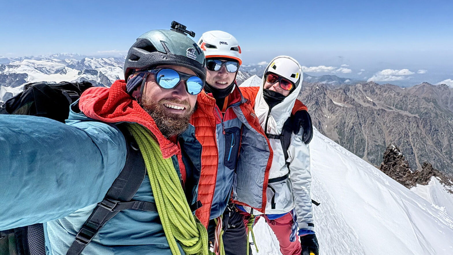 Mountaineers at the summit of Mt. Talgar, 4979 m